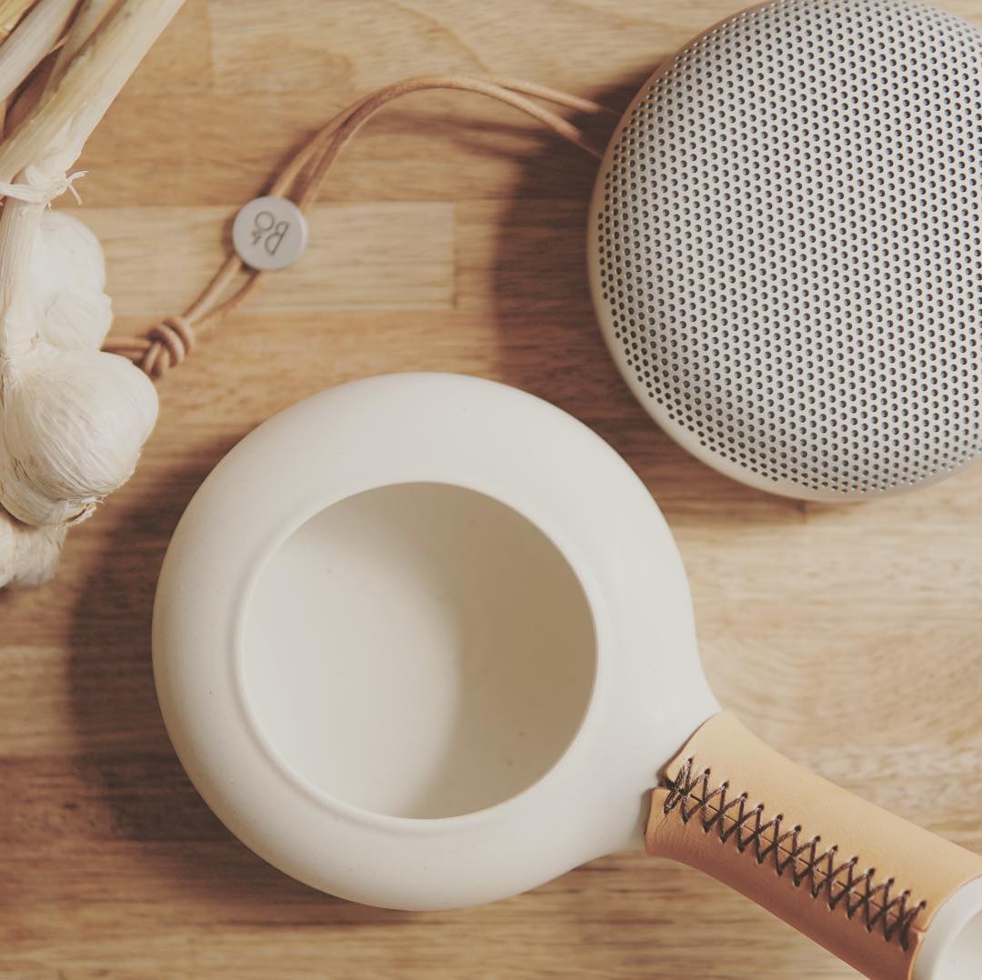 Zenroast and a metal cooling sieve on a wooden tray