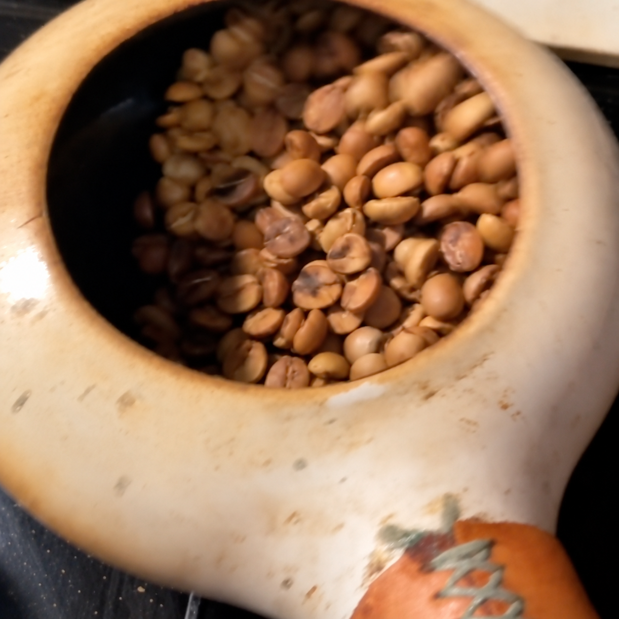 Coffee beans moving inside Zenroast during roasting